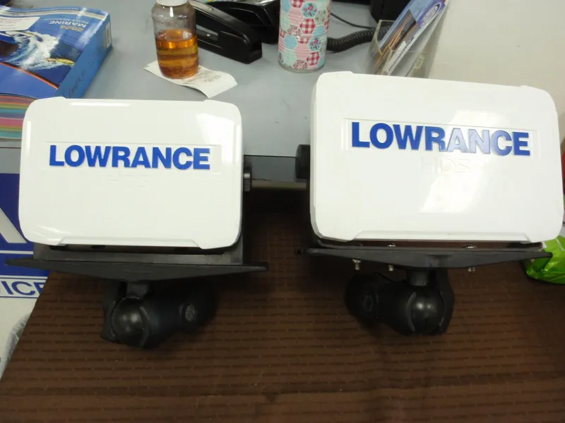 Slide: The Image of Two Lowrance fish finders on a table, suitable for Ranger Z518 Comanche 2017. - 20
