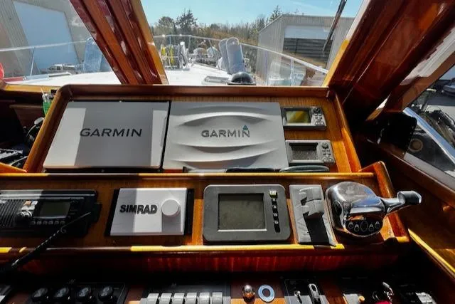 Slide: The Image of Control panel of 2003 Lyman-Morse Wesmac Sportfish Cruiser with Garmin and Simrad equipment. - 20