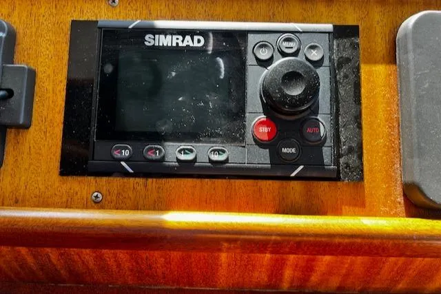 Slide: The Image of Simrad marine control panel on 2003 Lyman-Morse Wesmac Sportfish Cruiser. - 22