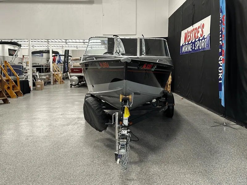 Slide: The Image of 2006 Lund 1800 Sport Angler boat on trailer in showroom. - 7