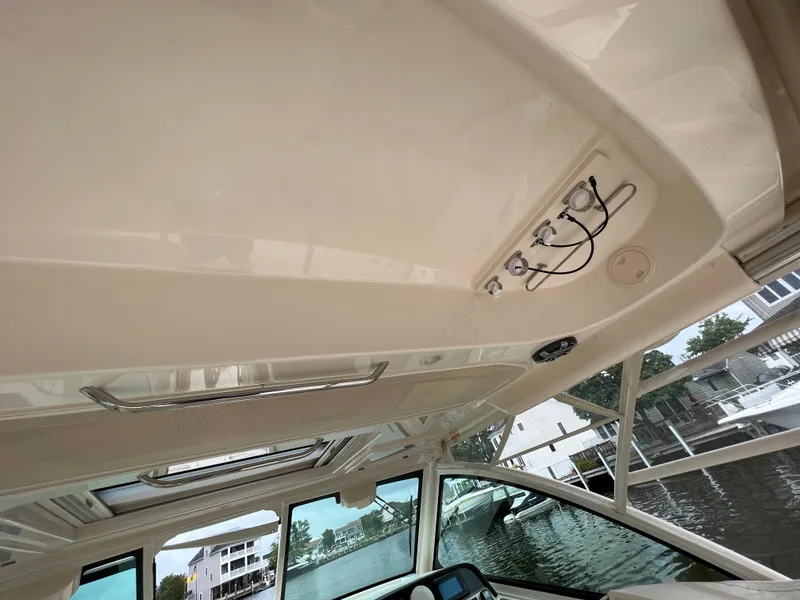 Slide: The Image of 2020 Grady-White Freedom 375 boat interior, featuring sleek design and modern controls. - 39