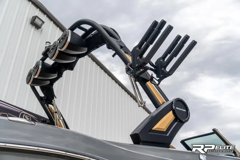 Slide: The Image of 2025 MasterCraft X22 boat with advanced wakeboard tower and speakers. - 17