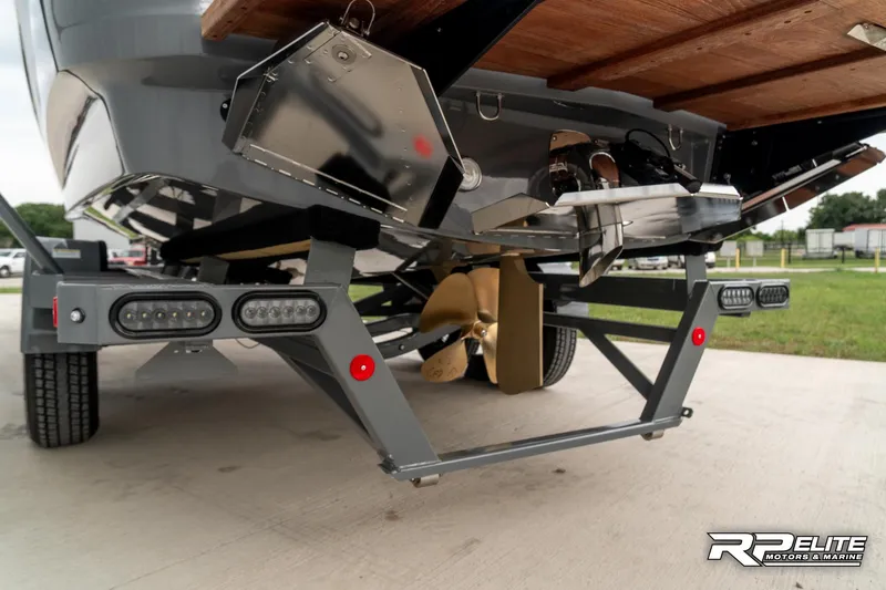 Slide: The Image of 2025 MasterCraft X22 boat trailer with advanced lighting and sturdy design. - 29