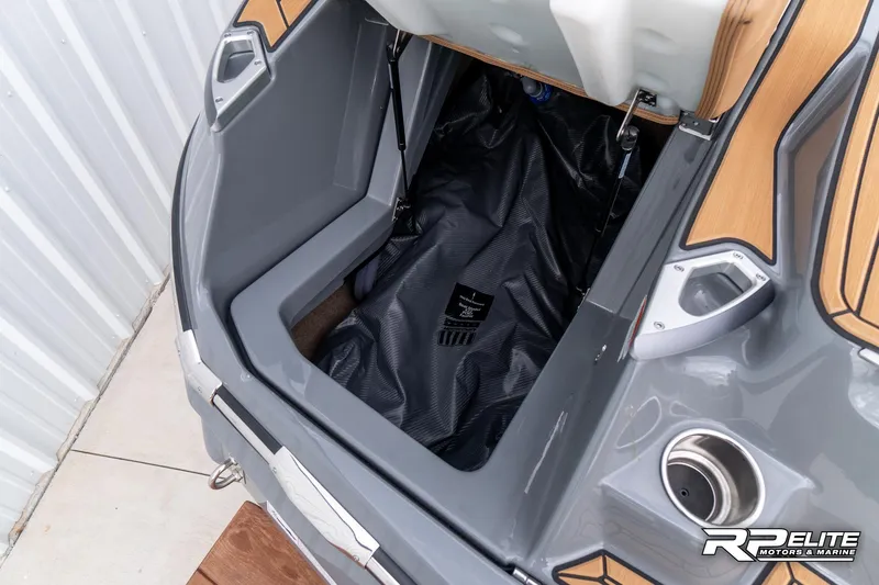 Slide: The Image of 2025 MasterCraft X22 boat storage compartment with sleek design and modern features. - 43