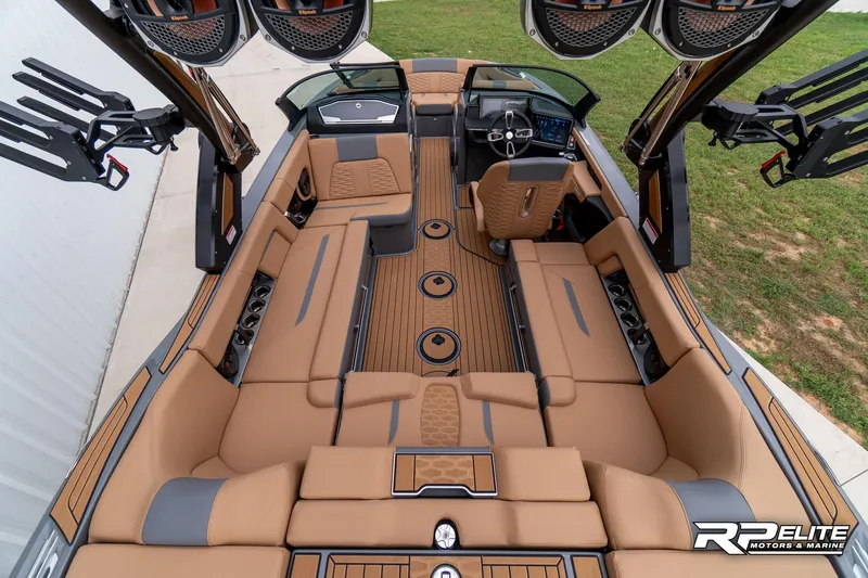 Slide: The Image of Luxurious interior of 2025 MasterCraft X22 boat with tan seating and modern design. - 49