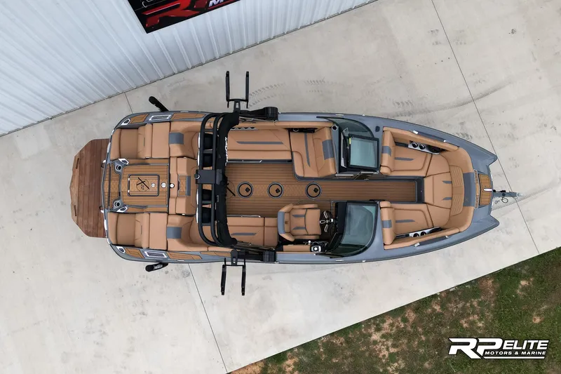 Slide: The Image of Overhead view of 2025 MasterCraft X22 boat with tan interior and sleek design. - 6