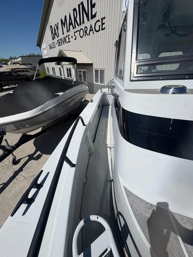 Slide: The Image of 2002 Boston Whaler 27 Vigilant at Bay Marine, boat storage and sales facility. - 7