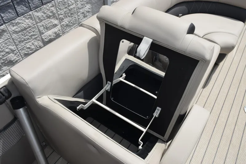 Slide: The Image of 2022 Silver Wave 2410 SW5 JS boat seat storage compartment open on deck. - 20