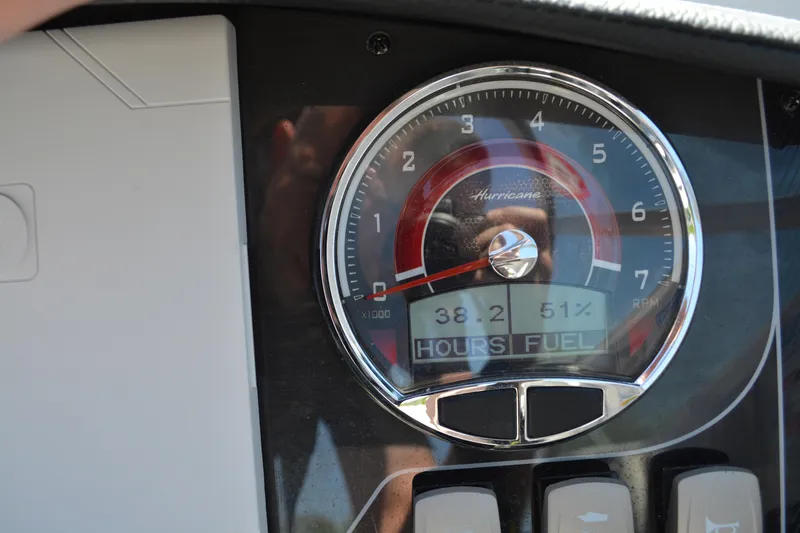 Slide: The Image of Dashboard of 2022 Hurricane SunDeck 2690 OB showing fuel gauge and hours. - 11