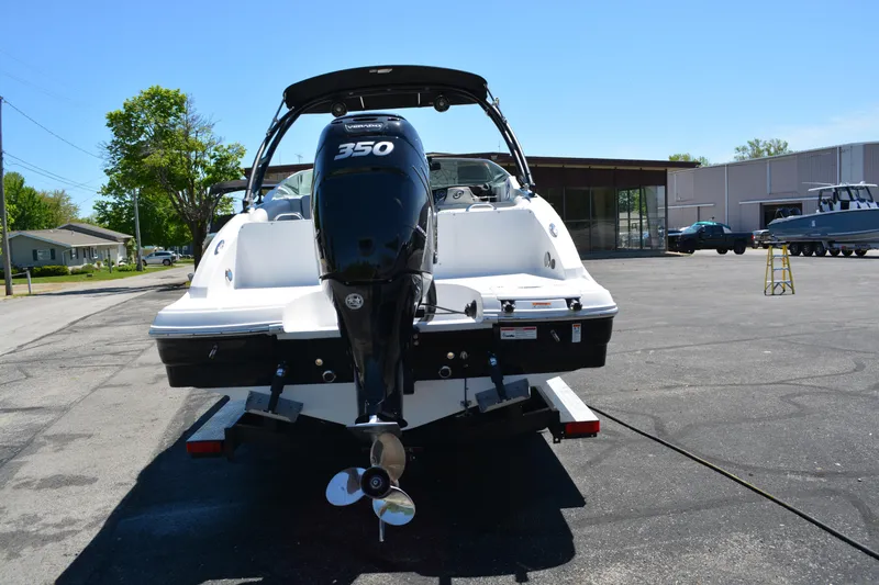 Slide: The Image of 2022 Hurricane SunDeck 2690 OB boat with 350 HP engine, parked outdoors. - 3