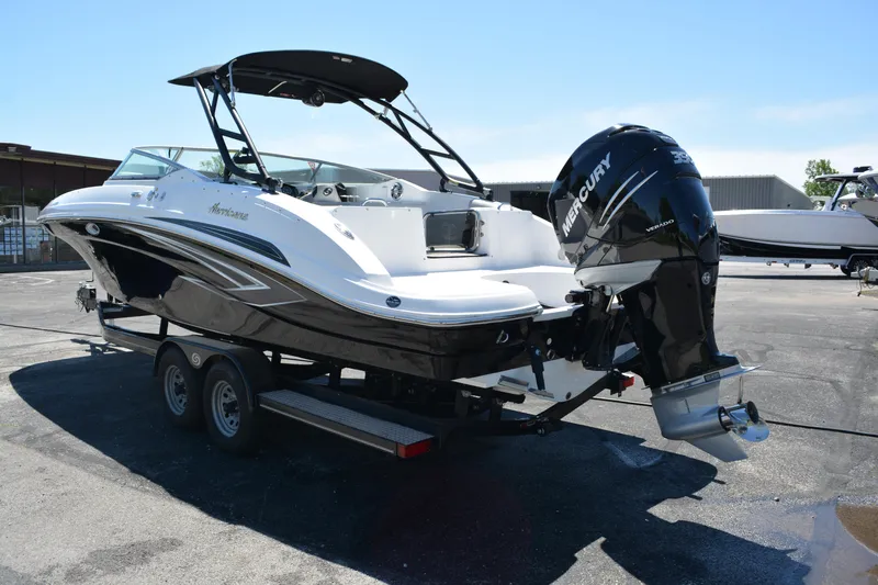 Slide: The Image of 2022 Hurricane SunDeck 2690 OB boat on trailer with Mercury outboard engine. - 4