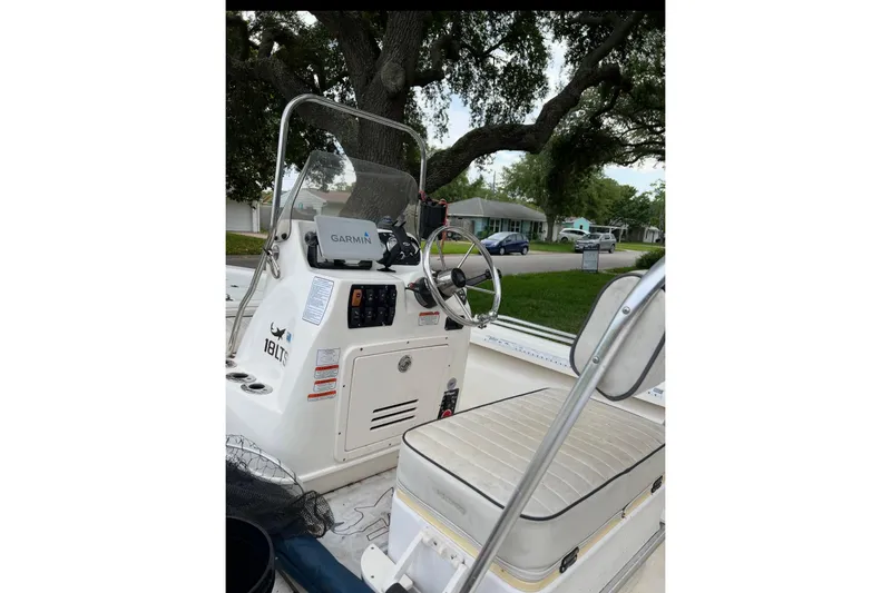 Slide: The Image of 2016 Mako 18 LTS boat interior with Garmin navigation system. - 4