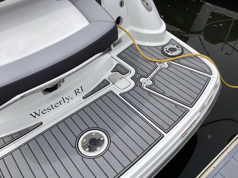 Slide: The Image of 2022 Monterey 295 Sport Yacht swim platform with gray decking, Westerly, RI. - 11