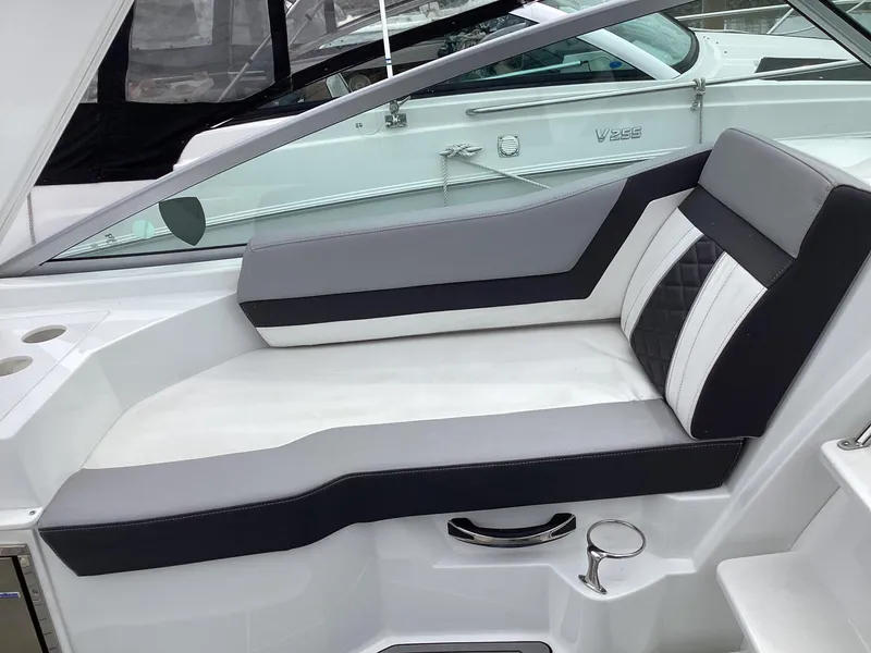 Slide: The Image of 2022 Monterey 295 Sport Yacht interior seating with sleek, modern design and comfortable upholstery. - 18