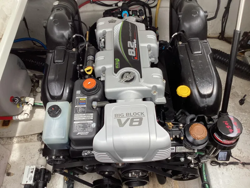 Slide: The Image of Engine of 2022 Monterey 295 Sport Yacht, featuring a powerful 8.2L Big Block V8. - 33
