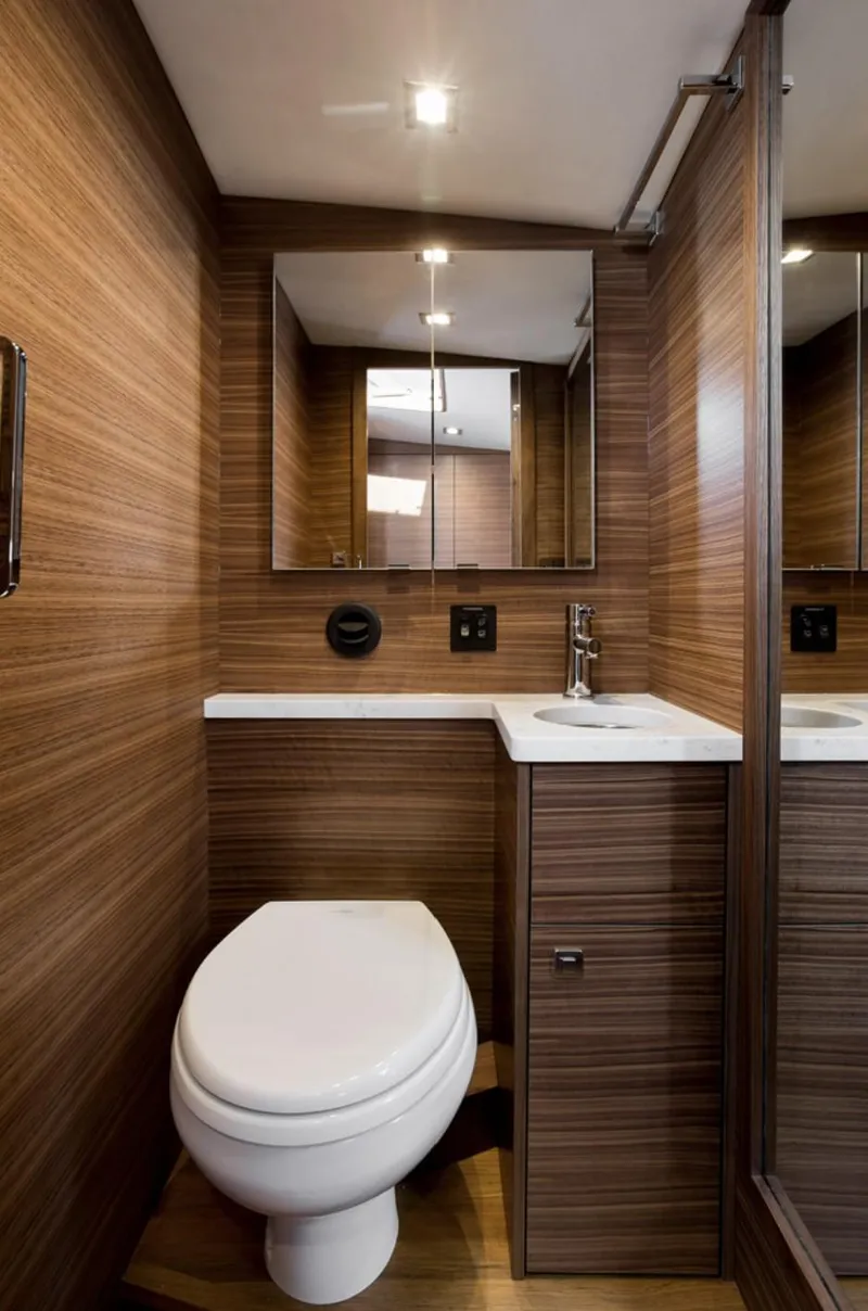 Slide: The Image of Luxurious bathroom in 2020 Coastal Craft 33 Express yacht with modern wood paneling. - 31