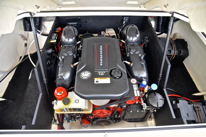 Slide: The Image of Engine compartment of a 2022 Regal LS4 boat featuring a Volvo Penta 350 V8 engine. - 30