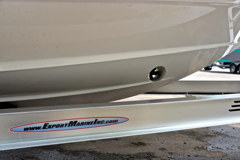 Slide: The Image of 2022 Regal LS4 boat hull on trailer, Export Marine Inc. branding visible. - 31