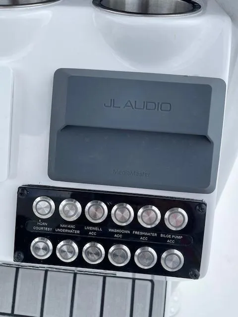 Slide: The Image of Control panel and JL Audio system on 2025 Tidewater 2500 Carolina Bay boat. - 30