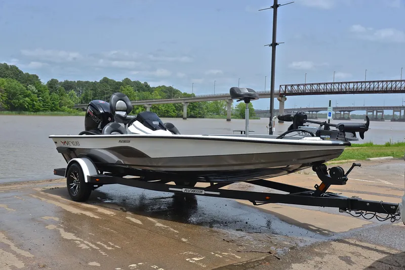 Slide: The Image of 2020 Vexus AVX1880 boat on trailer by river, ready for launch. - 16