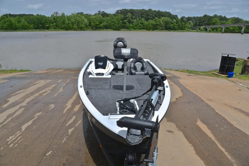 Slide: The Image of 2020 Vexus AVX1880 boat on a ramp by a lake, ready for launch. - 17