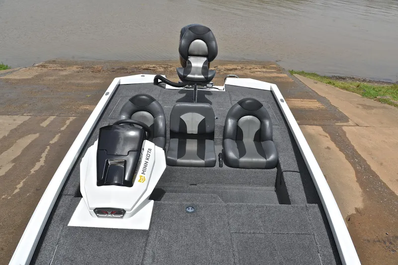 Slide: The Image of 2020 Vexus AVX1880 boat with three seats, docked by the water. - 22