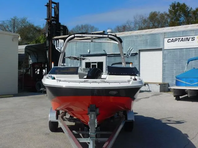 Slide: The Image of 2018 Four Winns HD 200 OB RS boat on trailer at Captain's facility. - 3