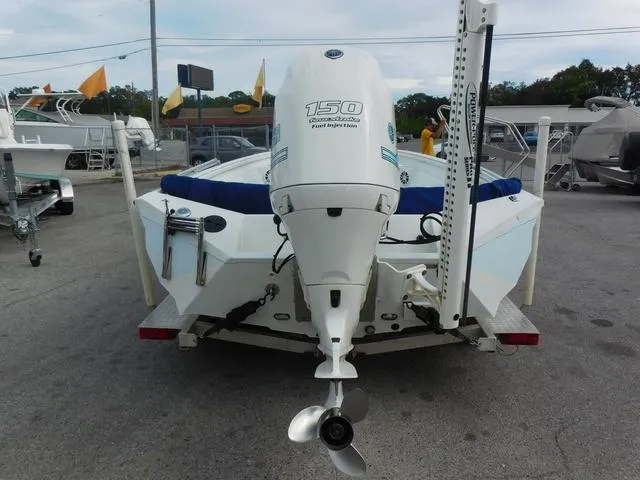 Slide: The Image of 2018 Excel Boats Bay Pro 220 with 150 horsepower outboard motor, rear view. - 4