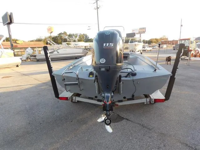 Slide: The Image of 2021 Xpress Boats H190 with 115 horsepower engine, parked on a trailer. - 4