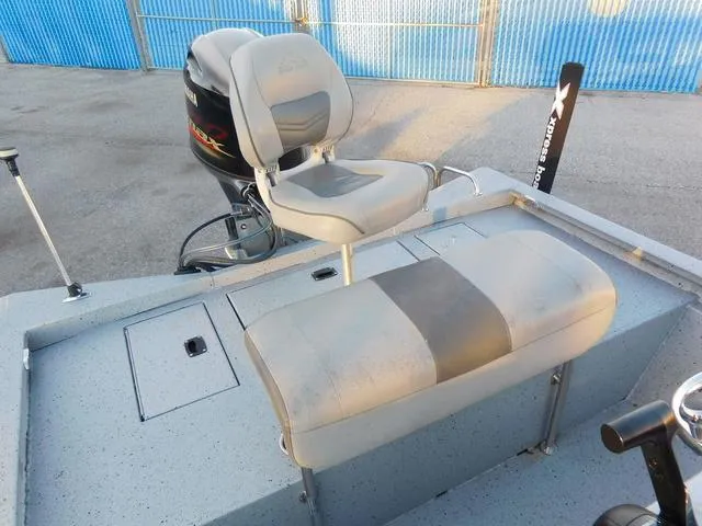 Slide: The Image of 2021 Xpress Boats H190 interior with seating and motor, showcasing modern design. - 7