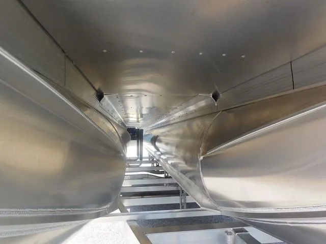 Slide: The Image of Underneath view of 2024 Avalon 2585 LSZ Quad Lounger pontoon boat, showcasing aluminum pontoons. - 5