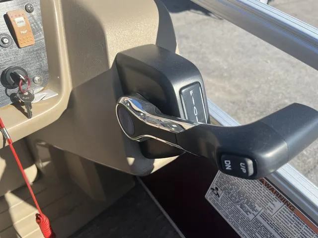 Slide: The Image of Boat throttle control on a 2020 Starcraft LX 22 R pontoon. - 11