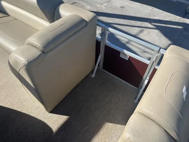 Slide: The Image of Beige seating on 2020 Starcraft LX 22 R boat, featuring durable upholstery and spacious layout. - 15