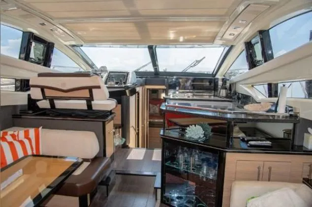 Slide: The Image of Luxurious interior of 2011 Marquis Sport Coupe yacht with plush seating and modern amenities. - 14