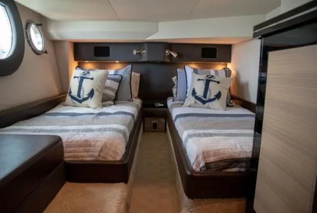 Slide: The Image of Luxurious 2011 Marquis Sport Coupe bedroom with cozy bedding and elegant decor. - 23