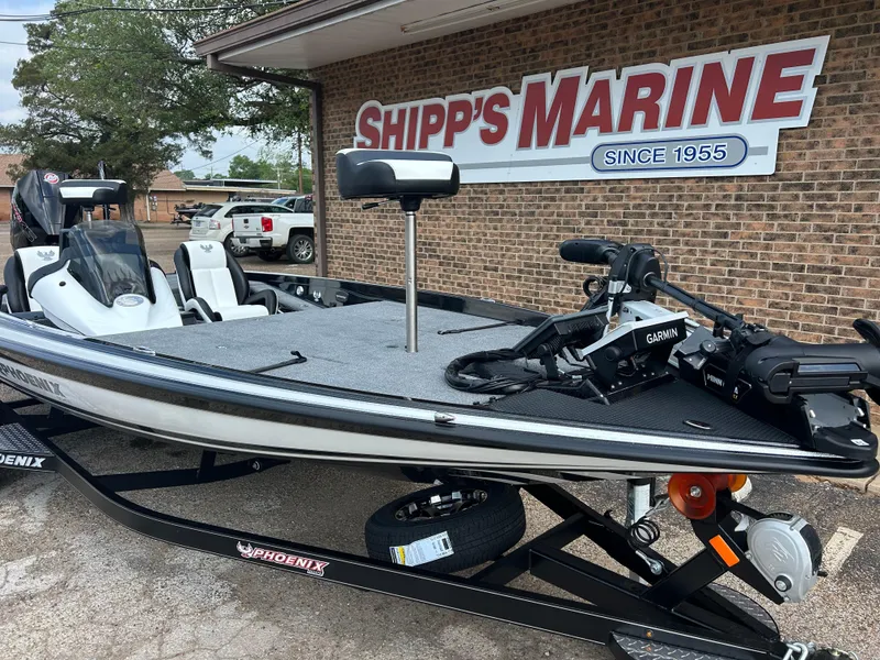 Slide: The Image of 2025 Phoenix 721 ZXL boat at Shipp's Marine dealership, featuring Garmin equipment. - 3
