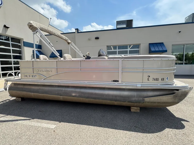 Slide: The Image of 2014 Sylvan Mirage Fish 8520 CNF pontoon boat parked outdoors. - 3