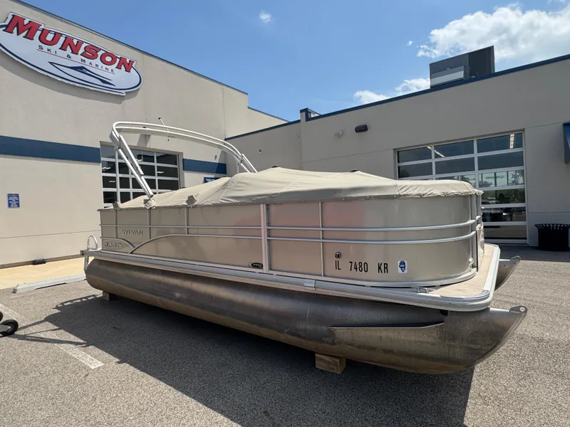 Slide: The Image of 2014 Sylvan Mirage Fish 8520 CNF pontoon boat parked outside dealership. - 4