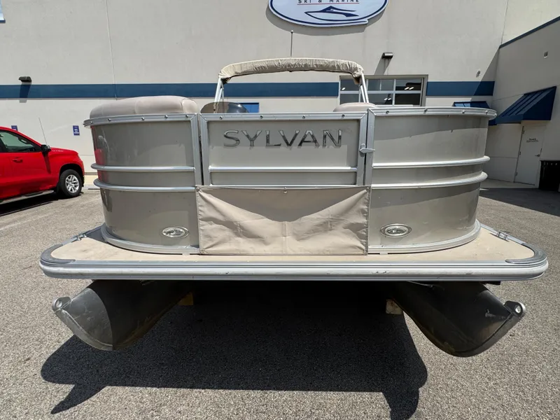 Slide: The Image of 2014 Sylvan Mirage Fish 8520 CNF pontoon boat, silver exterior, parked outdoors. - 6
