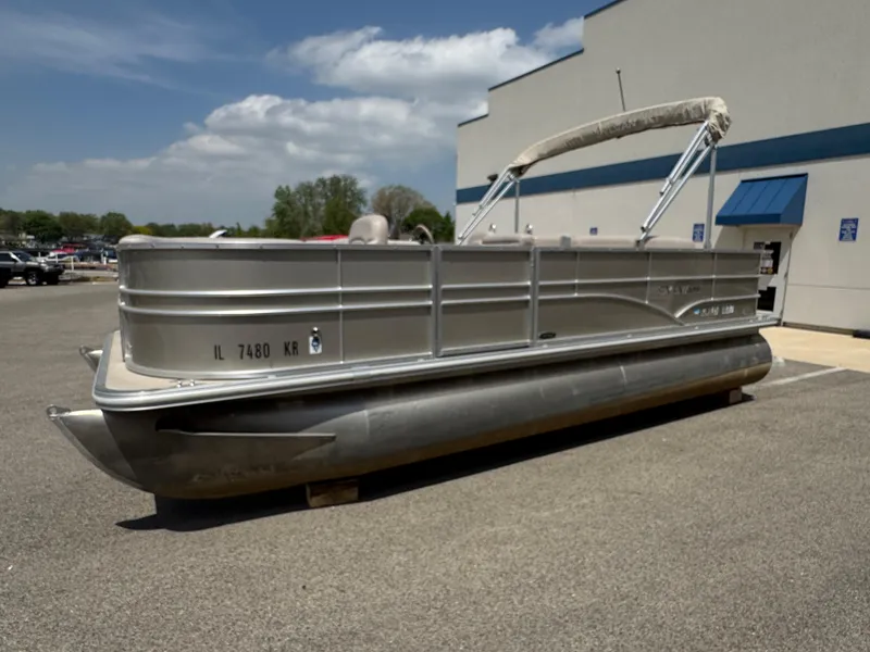 Slide: The Image of 2014 Sylvan Mirage Fish 8520 CNF pontoon boat parked outdoors. - 7