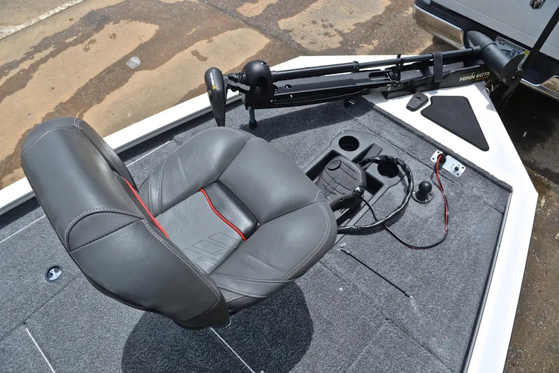 Slide: The Image of 2023 Bass Tracker Pro Team 195 TXE boat seat and control panel. - 26