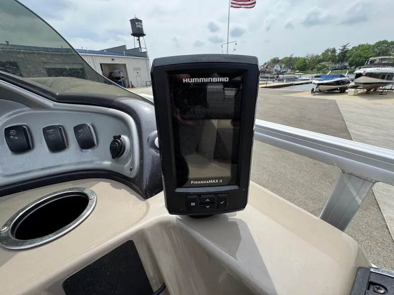 Slide: The Image of Control panel of 2021 Sun Tracker Party Barge 20 DLX with Humminbird fish finder. - 12