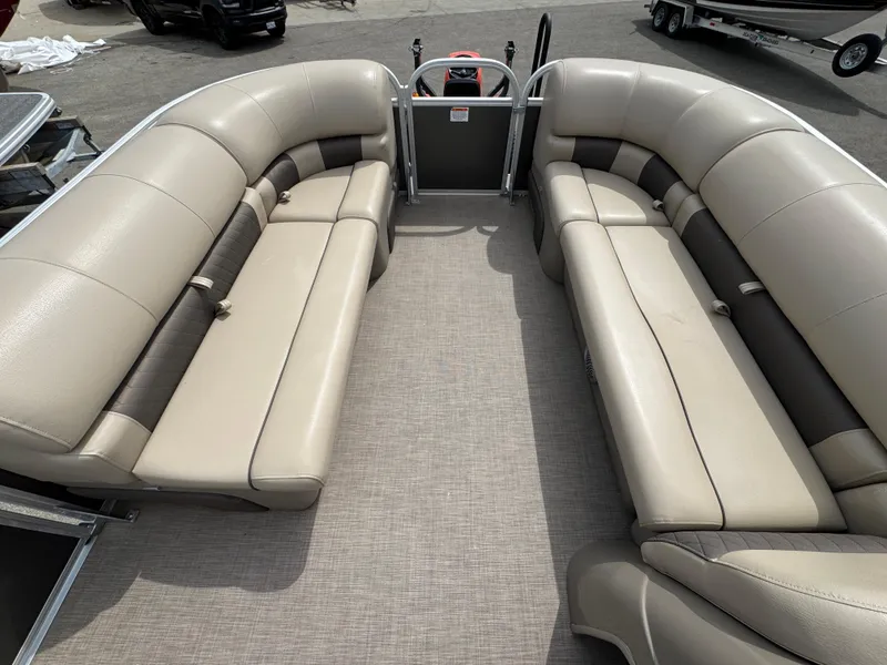 Slide: The Image of 2021 Sun Tracker Party Barge 20 DLX interior with spacious seating and modern design. - 14