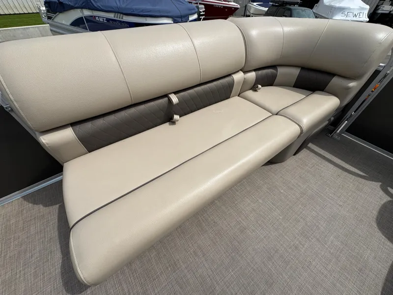 Slide: The Image of 2021 Sun Tracker Party Barge 20 DLX, beige and brown seating, spacious and comfortable. - 15