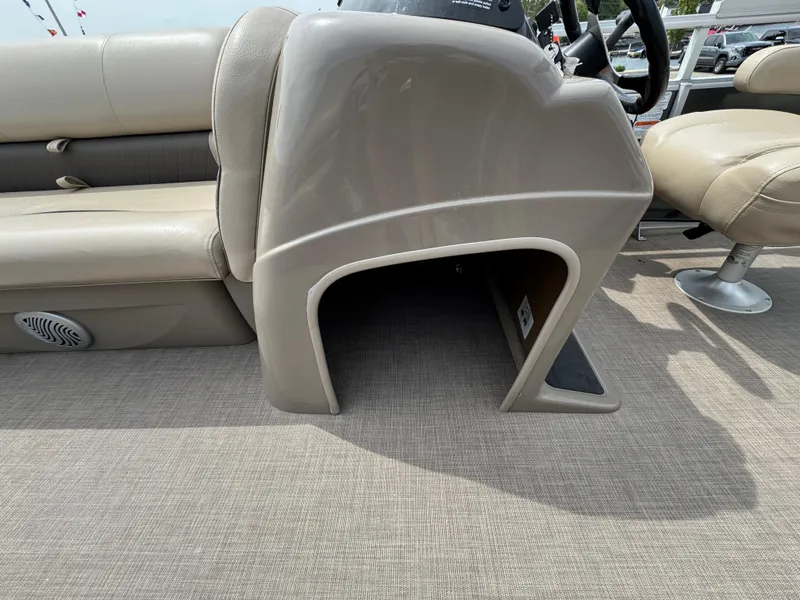 Slide: The Image of 2021 Sun Tracker Party Barge 20 DLX interior seating and console detail. - 17