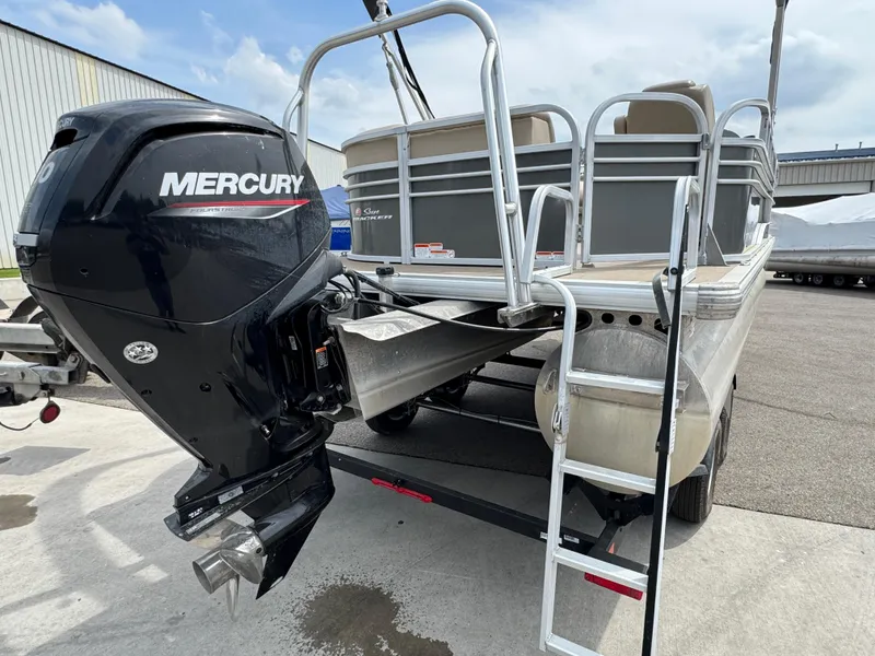 Slide: The Image of 2021 Sun Tracker Party Barge 20 DLX pontoon boat with Mercury outboard motor. - 4