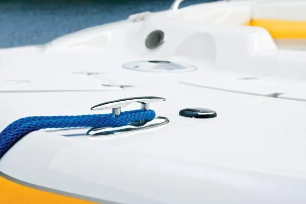 Slide: The Image of 2012 Tahoe 195 boat with blue rope on deck cleat. - 14