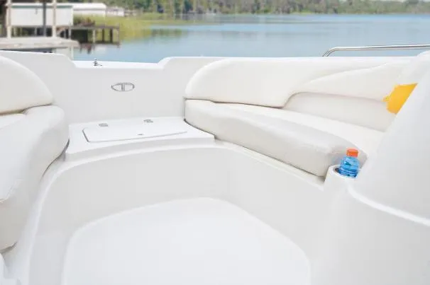 Slide: The Image of Interior of 2012 Tahoe 195 boat with white seating and lake view. - 17