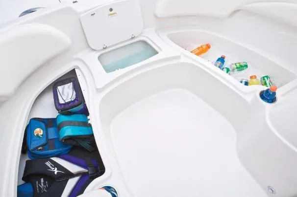 Slide: The Image of Interior of 2012 Tahoe 195 boat with storage compartments and beverages. - 32