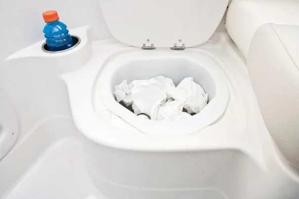 Slide: The Image of Boat toilet with paper waste and drink bottle, Tahoe 195, 2012 model. - 35